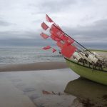 Fischerboot mit Boot und Fähnchen zum Beitrag persönliche Standortbestimmung Pia Forkheim Coaching